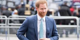 Prince Harry in Paul Smith with Meghan Markle in March 2020