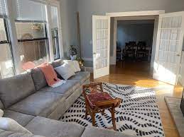 Pairing sectional sofas and coffee tables room for tuesday. How To Decorate A Living Room Without A Coffee Table Apartment Therapy