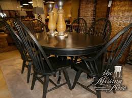 This traditional dining set includes a generous rectangular table and six chairs. Black Distressed Pedestal Dining Table With Six 6 Windsor Back Chairs In Black As Well Measure Dining Table Black Dining Table Chairs Farmhouse Dining Room
