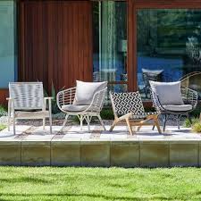 Black And White Wicker Patio Furniture Black And White Strap Girona Outdoor Accent Chairs Set Of 2 World Market In 2020 World Market Dining Chairs Outdoor Tables And Chairs Wicker Patio Chairs