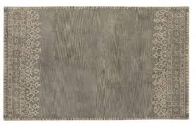 A tufting gun is used to shoot yarn through the fabric while passing by horizontally. Pottery Barn New Desa Gray Persian Hand Tufted 8x10 Design Wool Carpet Rug