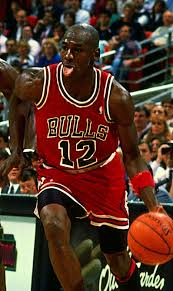 Jordan would also have his tongue sticking out as he was driving to the hoop. Michael Jordan Wearing Number 12 Michael Jordan Tongue Michael Jordan Sports