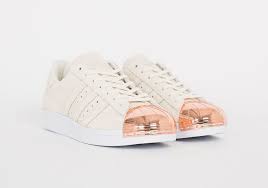Electroplated midsole plugs add a glam finish. Adidas Rose Gold Sneakers