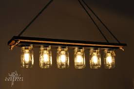 Rustic bear vanity light fixture 4 light. 12 Rustic Lighting Ideas Pickled Barrel