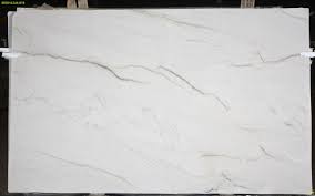 Black And White Quartzite Opus White Quartzite Is A Real Stunner With A Creamy White Backdrop And Gray Veins Simple Kitchen Remodel Replacing Kitchen Countertops Condo Kitchen Remodel
