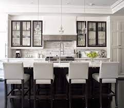 Price and stock could change after publish date, and we may make money from these links. 20 Polished Kitchens With Striking Black Kitchen Islands Dark Kitchen Island Trend
