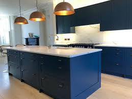 If the worktop is having heavy usage with sauce pans etc oil it, making sure it is spread thinly and evenly. Bespoke Wood Blue Kitchen Island With Stone Worktops Used Kitchen Hub