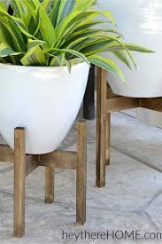 This outdoor table is perfect to sit beside a comfy chair and sit your drink on while you're enjoying your porch or deck. 30 Best Diy Plant Stand Ideas Tutorials For 2021 Crazy Laura