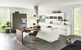 Pull out dining table cabinet. Handleless Kitchen Island With Dining Table Nolte Kuechen Com