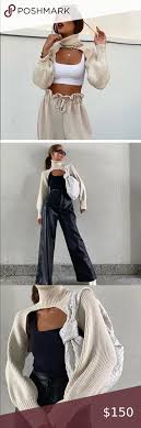 This vintage knitwear basic now comes in fun colors and embellishments, and in belted, oversized and cropped proportions. Buy Knit Arm Warmer Sweater Zara Cheap Online