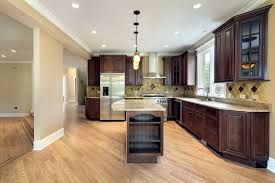 A popular color concept is white cabinets with dark countertops juxtaposed with dark island with white countertop. 46 Kitchens With Dark Cabinets Black Kitchen Pictures Dark Kitchen Cabinets Dark Wood Kitchens Wood Floor Kitchen