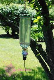 Mmmmm Diy Hummingbird Feeder Humming Bird Feeders Old Wine Bottles