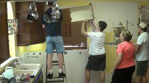 Newer cabinets, on the other hand, arrive as start by using the hammer to remove the frame on the front of the cabinet, followed by the sides, top, bottom, and back. Diy Kitchen Remodel 4 Removing Old Cabinets Youtube