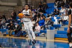 MEN'S BASKETBALL FALLS AT EMERSON, 86-58