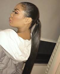 When a ponytail feels too boring, this edgy fishtail version is your jam. Low No Part Sleek Ponytail With Edges Sleek Ponytail Straight Hairstyles Ponytail Styles