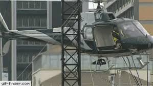 helicopter hits scaffolding find and share funny animated gifs helicopter funny gif gif