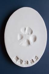 Paw print memorial stone $ 315. Clay Paw Prints Pet Memorial Services
