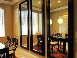 Dining Room With 3 Large Black Mirrors Dining Table Yellow Dining Room Traditional Dining Rooms Mirror Dining Room