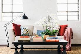 Back to article → red coffee table for a nice room focal level. 15 Designer Tips For Styling Your Coffee Table Hgtv
