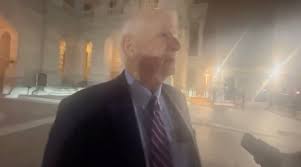 Cardin flexes naked feet after peel