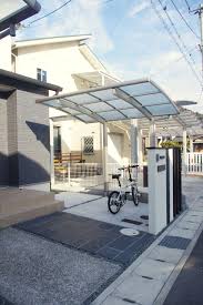 門柱裏にスッキリ納めたサイクルポート施工例 サイクルハウス 外構 駐車場 diy コンクリート