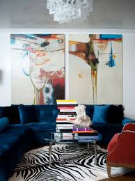 The sofa shows its prominence without even trying too much. Blue Velvet Sofa Modern Living Room Smith Boyd Interiors