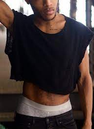 The crop has been gaining momentum in barbershops around the world. Crop Tops Are For Guys Mens Crop Top Crop Top Men Mens Crop Tops