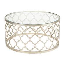 The transparent tempered round glass top shows the geometric. Tracery Silver Moroccan Quatrefoil Glass Top Coffee Table