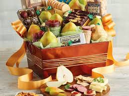 The basket includes 7 ounces of dry salami, 4 ounces of cheese, sourdough crackers, a nut and fruit snack mix, and california olives. The 11 Best Gift Baskets Of 2021