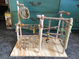 You will need a wooden tray or box top or something to be the base. Homemade Parakeet Play Gym Parrots