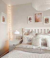 This bedroom, styled by ashley libath of ashleylibathdesign, screams hygge because it's uncluttered but cozy, with layer upon layer of fresh bedding. Scandi Boho Bedroom With White Ikea Hemnes Furniture And Fairy Lights Tassled C Bedroom B Boho Bedroom Bedr Hygge Living Room Hygge Decor Boho Bedroom Decor