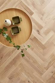 Junckers Twin Herringbone Nordic Oak Floor Above Wood Table Photo Rocio Chacon Low Res Wood Flooring Company Solid Oak Floors Wood Parquet Flooring