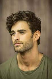 In fact, wavy hair men have stylish volume and beautiful texture built right into all their trendy cuts and styles. Mens Long Hair Is A Growing Trend Long Sleak Clean And Healthy Is The Look Not Stringy And Luster Mens Hairstyles Thick Hair Wavy Hair Men Thick Wavy Hair