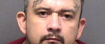 Discarded bandana leads police to man accused of robbing smoke shop,  kidnapping woman