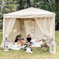 Try These Diy Garden Patio Gazebos Tips Tio Swing In A Beautifully Designed Garden Oasis Patio Surrounded By Ferns A In 2020 Backyard Camping Canopy Outdoor Gazebo