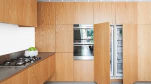 Each handle profile on door and drawer front needs to be programmed separately and all exposed plywood edges need to be sanded. Integration Peter Hay