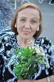 Mary Davies was a professional singer and appeared as Carmen The Nurse