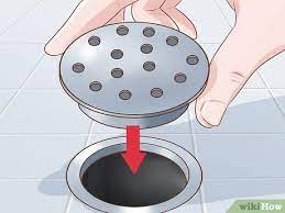 If your drain has a removable cover, using pliers or a wire hanger could be a great way to get hair out of the drain. 3 Ways To Prevent Hair Clogs Wikihow