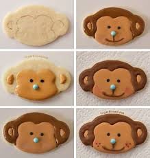 How To Make Lion And Monkey Cookies For A Jungle Party Monkey Cookies Animal Decorated Cookies Safari Cookies