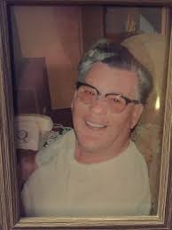 Louie Holman Obituary (2003)