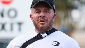Rarely seen fashion designer Alex Perry, 61, looks almost unrecognisable as  he is spotted shopping at Coles in Sydney