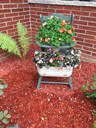 I Used My Children S Wooden High Chair And Repurposed It As A Keepsake Planter For Our Garden Garden Chairs Design Wood High Chairs Vintage High Chairs