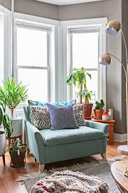 6 Paint Colors That Will Make A Room Look Bigger Bay Window Living Room Living Room Windows Arm Chairs Living Room