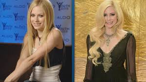 She doesn't use autotune or playback. Avril Lavigne Responds To Conspiracy Theories That She Died Years Ago Entertainment Tonight