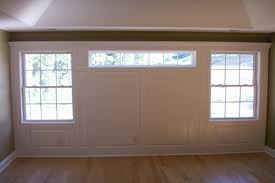 How would you handle the wainscoting if a window is in the mix… wainscoting has been around since roman times. Integrate Window And Door Trim With Wainscoting Panels