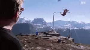 Gymnast Base Jumper Falls Off Cliff Animated Gif Make your own images with our meme generator or animated gif maker. gymnast base jumper falls off cliff