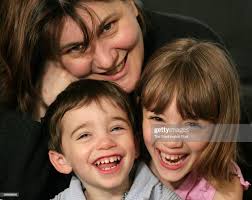 Sheryl Stein shown with her children, 23-month-old Julian Sweetman,... News  Photo