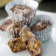 It has crush up cookies in there. Slow Cooker Chocolate Candy Recipe From Trisha Yearwood Favorite Dessert Recipes Chocolate Candy Recipes Chocolate Treats