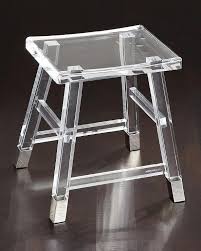 This adorable vanity chair is petite enough to tuck in a bathroom or bedroom, and brimming with feminine this clear, acrylic vanity stool with attached white suede cushion provides plush comfort. Darnell Acrylic Chrome Vanity Seat