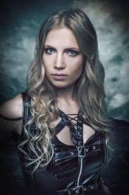 Elina Siirala from Leave's Eyes. Many of you probably don't know this, but  she is related to Tuomas Holopainen. She's his second cousin. Fun fact.